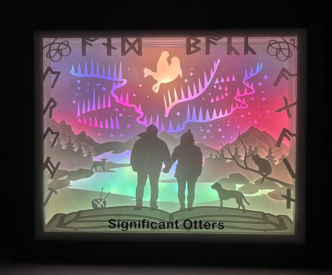 Northern lights paper-cut shadow box, lit from inside, made by Krishacraft in Waterloo
